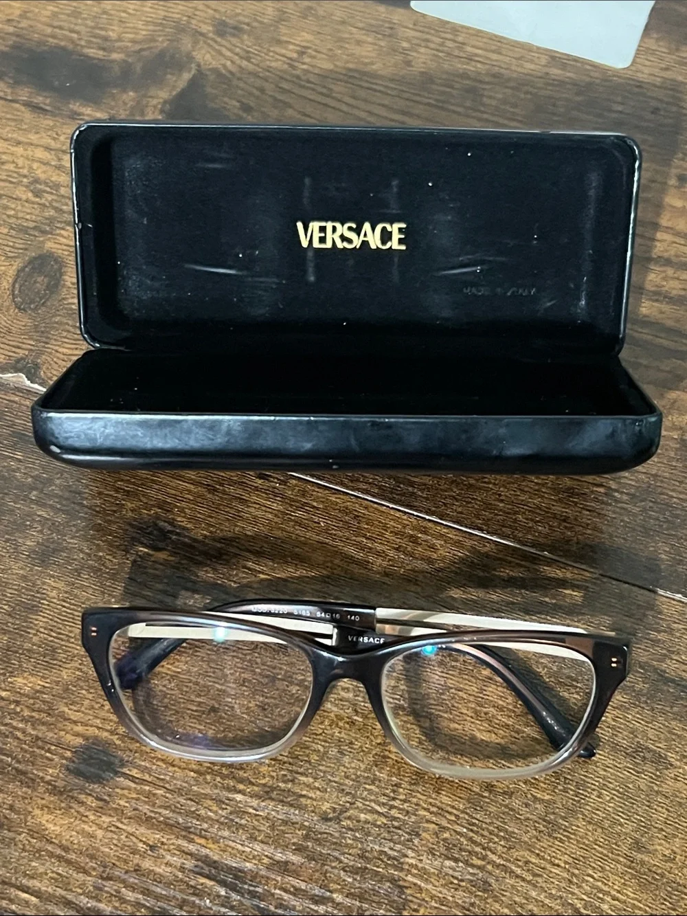 Versace Black Frame Sunglasses with Gold Temples